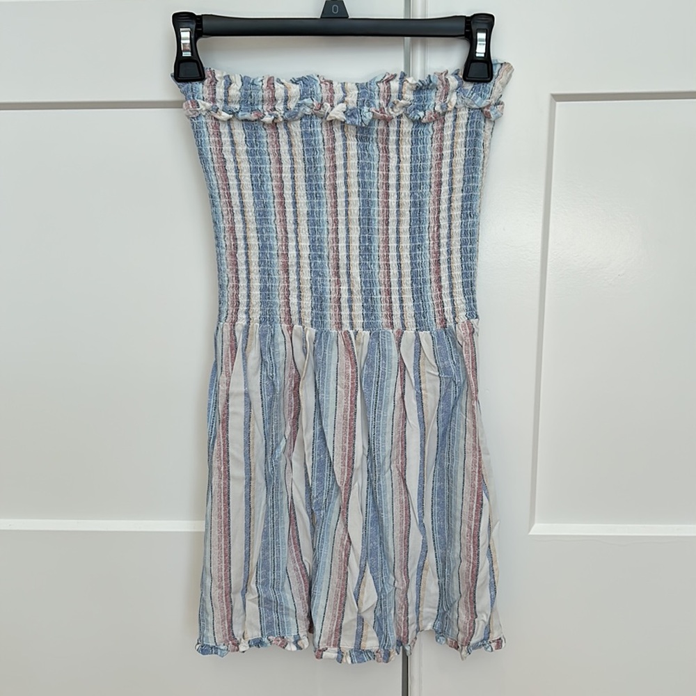 Woman’s small strapless spring/summer dress.